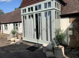 The Byre, converted barn king suite