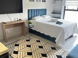 Studio Premium - Perto de Tudo - Vista Livre - Estacionamento privativo e Portaria 24h - Wi-Fi 600mbps