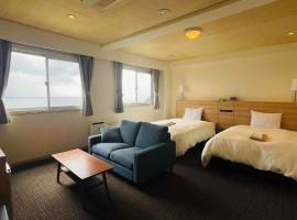 Amakusa Onsen Hotel Shikisakikan, hotel na praia em Reihoku