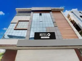 Super Hotel O Pathanamthitta Near Mahatma Gandhi Statue