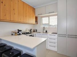 Big Bay Beach Club, acomoda&ccedil;&atilde;o com cozinha em Big Bay