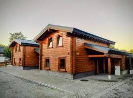 Chalet Momage dichtbij Skiliften, Skiverhuur en Bikepark!