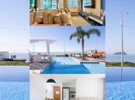 Apto Vista Mar Home Club Pé na Areia 3 Quartos Ares Condicionados Cozinha Completa Piscina Aquecida Jacuzzi Sauna Academia Quadra Playground Salão de Jogos 15min do Beto Carrero, ξενοδοχείο σε Picarras