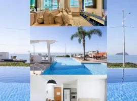 Apto Vista Mar Home Club Pé na Areia 3 Quartos Ares Condicionados Cozinha Completa Piscina Aquecida Jacuzzi Sauna Academia Quadra Playground Salão de Jogos 15min do Beto Carrero