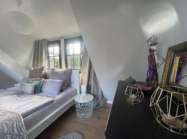 CHARMANTE WOHNUNG mit Garten, gemütlich, ruhig, zentral, hotell i Neukirchen-Vluyn