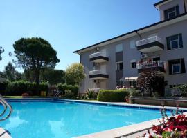 Beachside flat with shared pool
