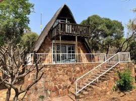 Tshiamo Bush Chalet, casa de muntanya a Buffelspoort