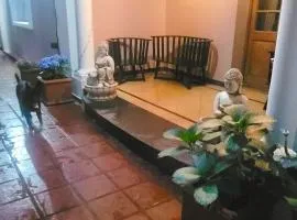 Hostel con habitación compartida