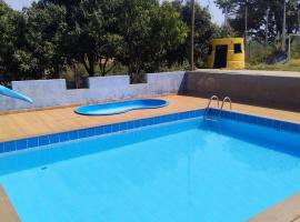 casa com quartos، فندق في São Joaquim de Bicas