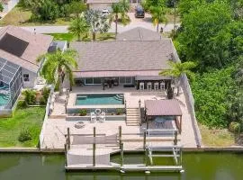Waterfront Retreat with Pool Tiki Bar & Boat Dock