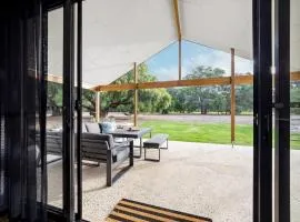 Turf and Surf Luxe Retreat Backing onto Golf Course