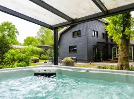 Boshuys 20 personen met Jacuzzi en Sauna
