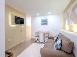 Modern Comforts – 4 Bedroom Home for Work & Play