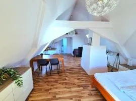 Dachgeschosswohnung 1 - Apartments am Schloss
