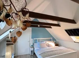 Lüttje Koje - Ferienhaus direkt am Deich und dem Meer dahinter