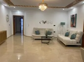 Charming 2-Bedroom Apartment with Garden View Balcony
