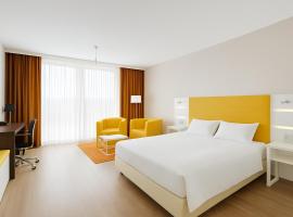 Hotel Montago- Dein großes Zimmer mit hervorragender Infrastruktur, ξενοδοχείο διαμερισμάτων σε Neu Isenburg