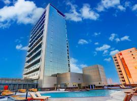 Sunday Hotel & Residences by CheckIn Gurugram, отель в Гургаоне