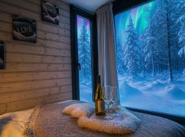 Lapland Landscape Cabin with Nature View, Sauna, Fireplace & Kitchen, Ylläs, Äkäslompolo, Riverside Village, hotel u gradu Akaslompolo