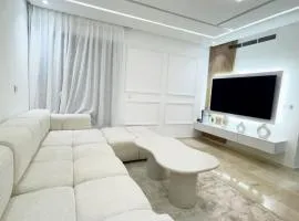 Appartement de Luxe 3 Chambres avec piscine au centre