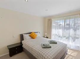 Comfortable 4-Bedroom Home with Backyard Escape