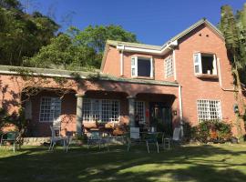 Wisdom Garden Home Stay, hotel v destinaci Yuli
