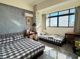 大橋旁民宿, hotel con estacionamiento en Jincheng