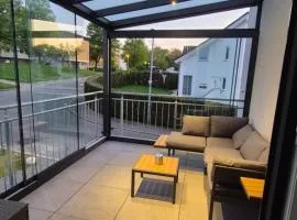 Apartments Seibel Doppel-Zweibettzimmer mit Küche und Wintergarten