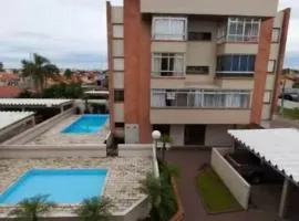 Aconchegante apartamento com piscina