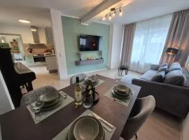 NAVIA Luma - Design Apartment - Stylisch, voll ausgestattet, mit Parkplatz