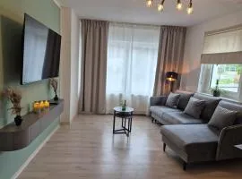 NAVIA Luma - Design Apartment - Stylisch, voll ausgestattet, mit Parkplatz