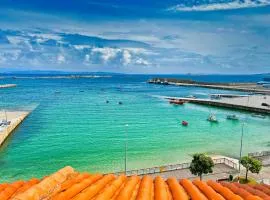 Lujo y vistas panorámicas en primera línea de mar