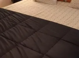 Chambre privée dans maison partagée