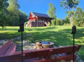 Solar powered log cabin with mountain views, 3acres
