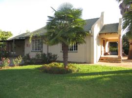 Dandelion Cottage, hotel v mestu Boschkop