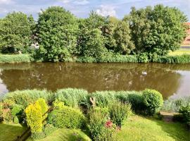 Ferienwohnung Austernfischer, mit Sielblick, hotel in Dornumersiel