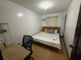 2-Bedroom Condo in Imus Cavite with UNLI WIFI, 50" TV, Netflix, Family Computer, Pool