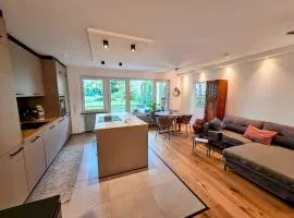 Design-Wohnung im Zentrum mit Balkon und Parkplatz