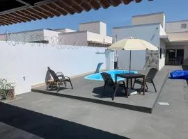 Linda Casa com piscina Aquecida e área de lazer
