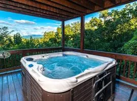 Moonstruck - Stone Firepit with a Waterfall, Outdoor Hot Tub, Game Room + Chalet Village Access