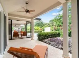 Beautiful Home in a Gated Neighborhood Walking Distance to the Beach with Garden Views and a Pool