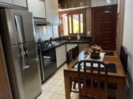 Casa de veraneio 2 dormitórios，位于托雷斯的酒店