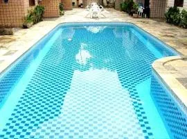 FLAT EM JUQUEHY COM AR COND, PISCINA e CHURRASQUEIRA