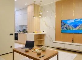 Nest One Luxe, Элитные апартаменты с балконом и видом на фонтан Tashkent City Park 008