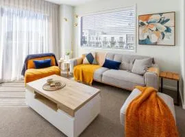 2BR Green Frame Views & Stadium Outlook plus Parking