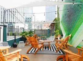 Sleeps 8 Walkable SoBro Suites w Local Art Vibes – by AvantStay