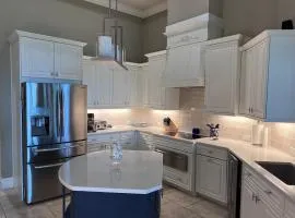 Expansive 1-Story Home on Twin Eagles Talon Golf Course Ideal for Family Gatherings