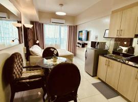 Breeze Staycation by Charmed, apartmen servis di Sampong
