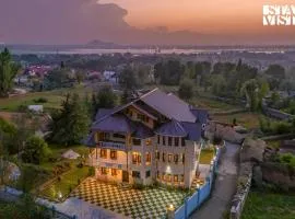 StayVista at Lakeside Panorama with Lawn & Wi-Fi