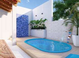 Casasveraneio casa top com 3 suítes com ar condicionado a 100 m da Praia - Barra de São Miguel, 7 minutos do gunga e 3 da praia bonita e conchas ! Área gourmet particular com churrasqueira , chuveirão !condomínio com muito verde,piscina de 10m!, hotel v destinaci Barra de São Miguel